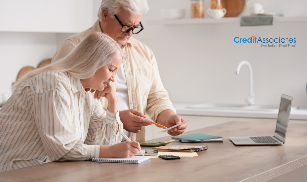 Person reviewing credit card statements at home